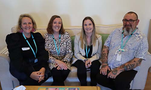CatholicCare Victoria staff sitting on couch
